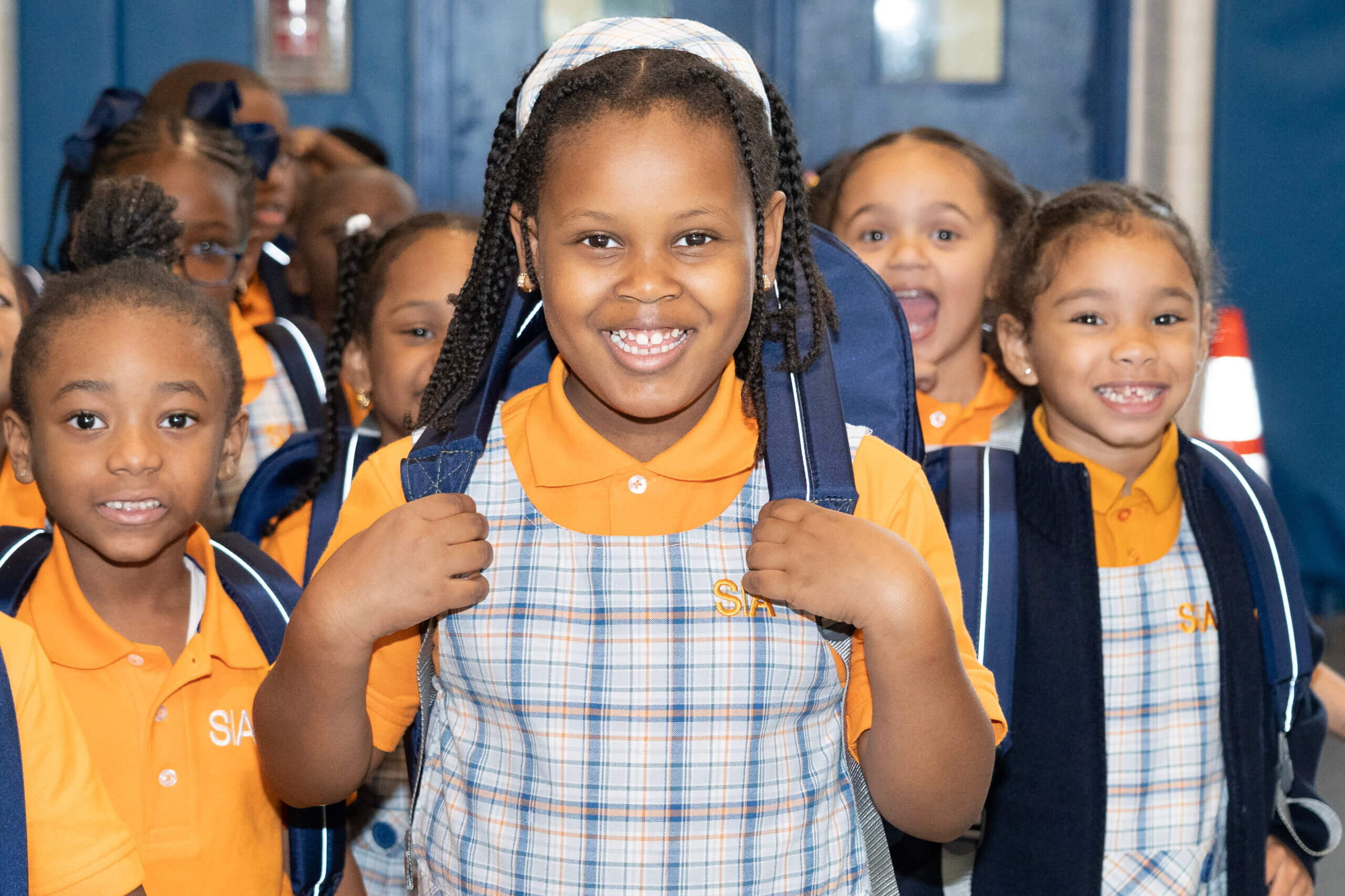 group of charter school students smiling